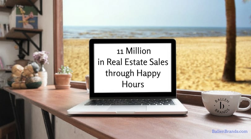 Computer is sitting on a table in front of a window. There's a beach right outside the window. Words on the screen say 11 million in real estate sales through happy hours