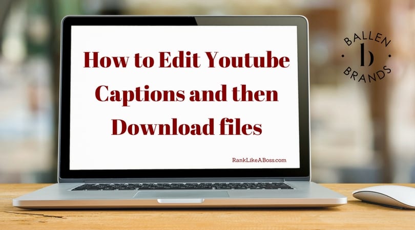 Notebook computer is on a table, could be macbook, words in red on the screen say how to edit youtube captions and then download files